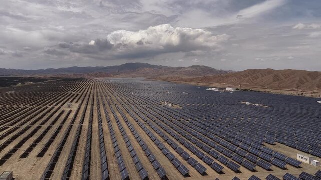 Renewable Energy Landscape with Solar Panels and Wind Turbines in Arid Hilly Terrain of Northwest China