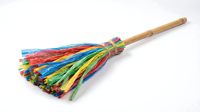 Handmade Colorful Plastic Strip Broom on White Background
