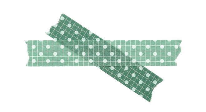 Two strips of green washi tape with a white grid and polka dot pattern, arranged in an x shape, isolated on transparent background