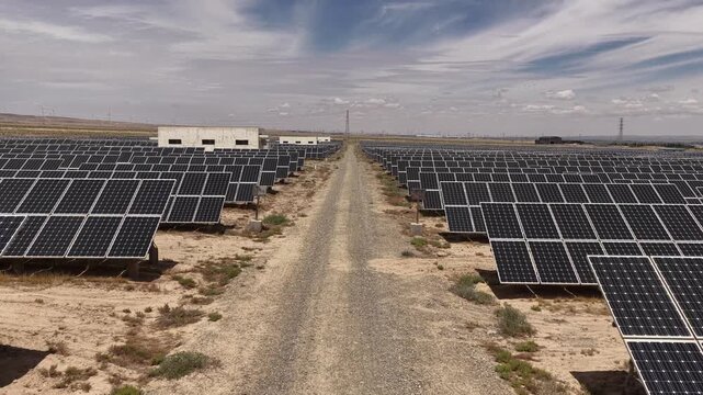 Renewable Energy Landscape with Solar Panels and Wind Turbines in Arid Hilly Terrain of Northwest China