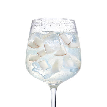 Cold drink with condensation on glass filled with ice and coconut pieces refreshing png