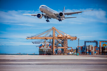 Fototapeta premium Cargo airplane flying over shipping containers and large cranes global logistics international trade and supply chain management concepts of cargo delivery import and export.