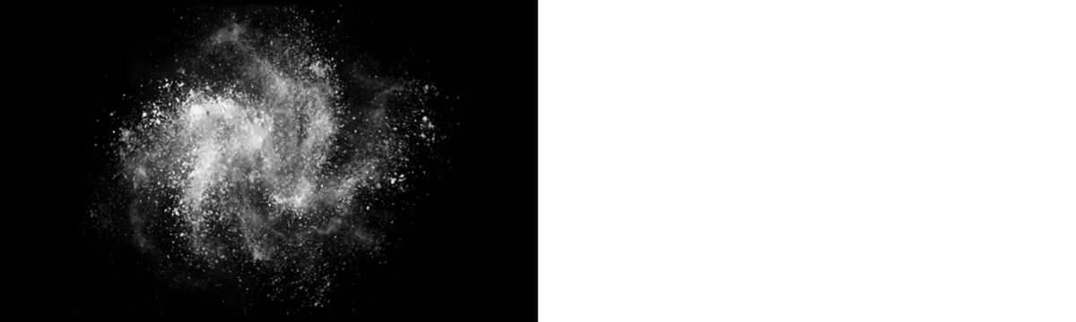 Explosion of white powder or flour isolated on black background, freeze motion of dust particles, abstract cloud isolated on transparent background