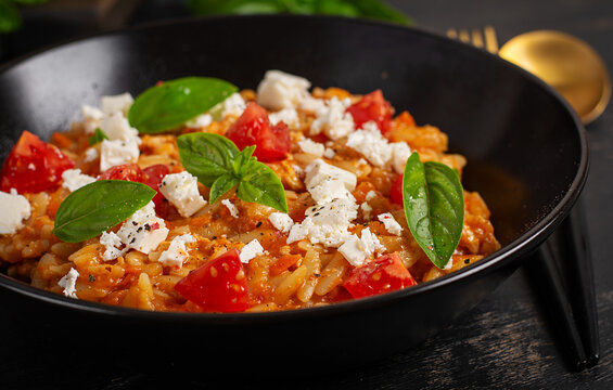 Greek Style Orzo Risotto Served with Basil and Feta