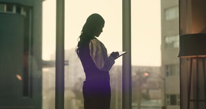 Business, lawyer and review in office with tablet, research and online evidence for court case. Woman, attorney and reading at law firm with tech, witness statement and legal records for proceedings