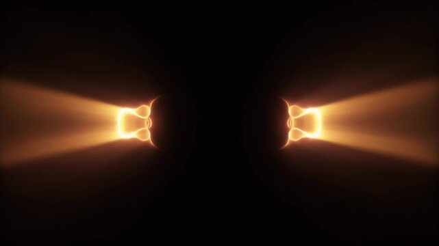 Warm glowing plasma mass splits into two smaller luminous fragments, connective tendrils gradually thinning and releasing as fragments drift apart against deep black, creating dramatic futuristic