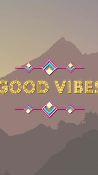 Animation of the words good vibes in yellow with graphic elements over forest mountains at sunset