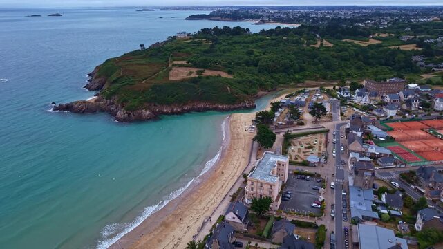 Longchamp Beach and Pointe du Decolle at Saint-Lunaire, Ille-et-Vilaine, Brittany, France, overlooking the English Channel and Emerald Coast with sandy bay, coastal headland and waterfront district