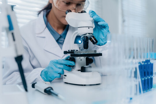 Scientists research biochemicals in a laboratory to advance health care innovation
