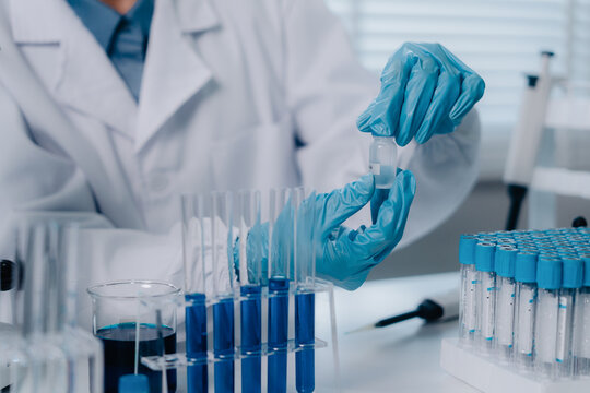 Scientists research biochemicals in a laboratory to advance health care innovation