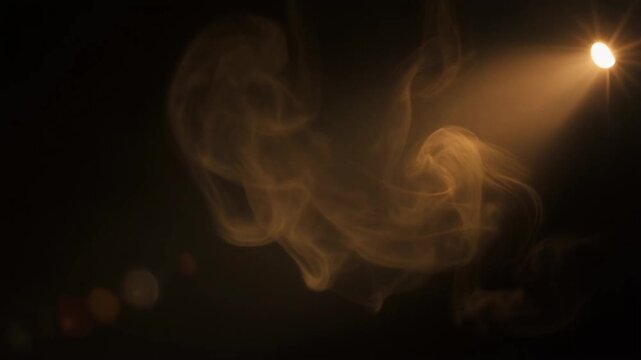 Warm light beam sweeping through drifting smoke
