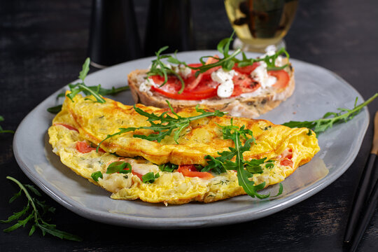 Healthy Breakfast Concept with Egg Omelette and Rustic Sandwich