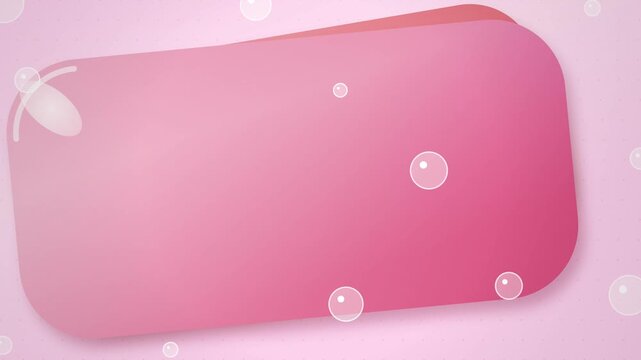 Pink capsule with bubbles floating.