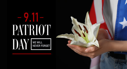 Obraz premium Patriot day 9.11 remembrance with a white lily in a hand and american flag, we will never forget