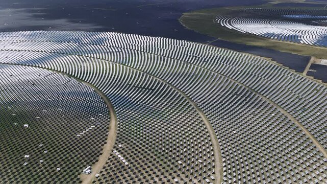 Aerial Close-Up of Heliostats Array in Talatan Tower Solar Thermal Power Plant: Concentrated Solar Power and Clean Energy Base in Qinghai