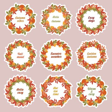 Nine autumn wreaths with colorful leaves and cozy seasonal quotes on pink background. Perfect illustration for fall design
