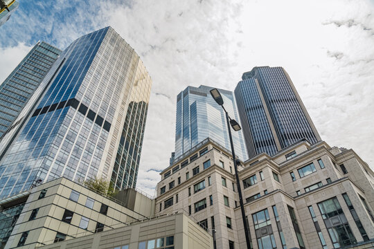 View of modern glass skyscrapers and historic architecture in the City of London, London, England, United Kingdom.