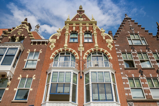 Jugendstil architecture decorates a historic facade in Delfshaven, Rotterdam, Netherlands