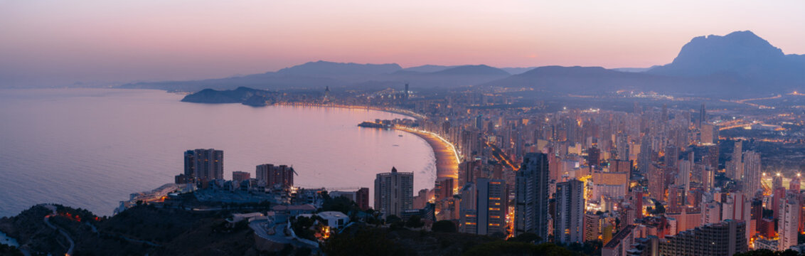 Panoramic Aerial View of Benidorm City Skyline and Coastline at Twilight, Spain