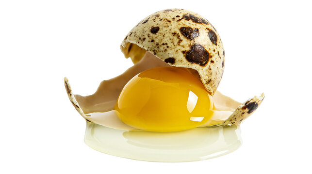 Cracked speckled quail egg with bright yellow yolk, isolated on transparent background