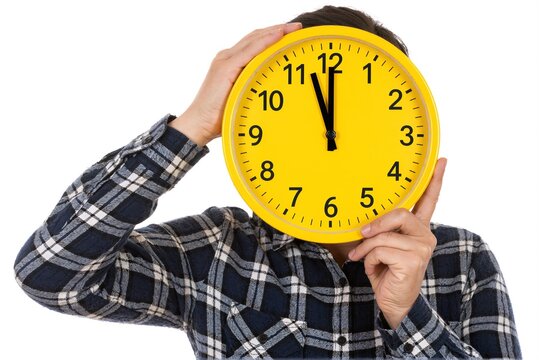 Person Holding Large Yellow Clock Face