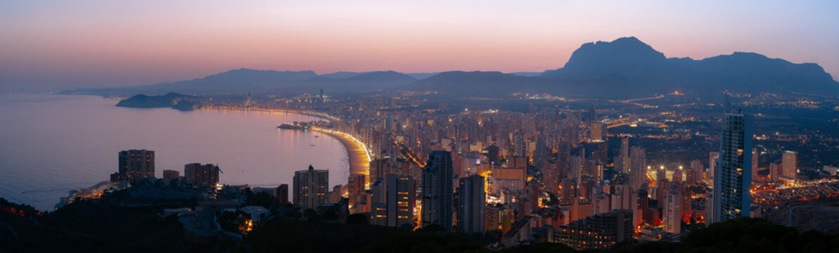 Panoramic Aerial View of Benidorm City Skyline and Coastline at Twilight, Spain