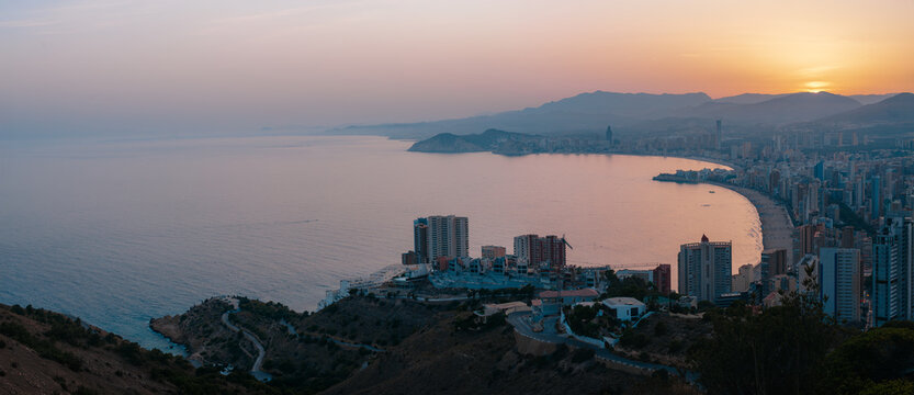 Panoramic Aerial View of Benidorm City Skyline and Coastline at Twilight, Spain