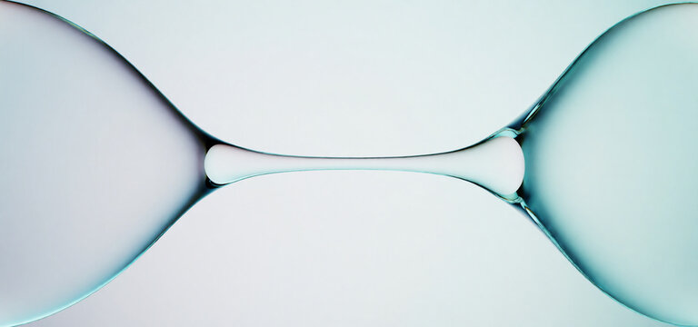 Transparent aqua capillary bridge between liquid planes