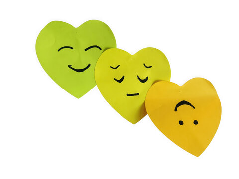 Three colorful heart shapes with different facial expressions