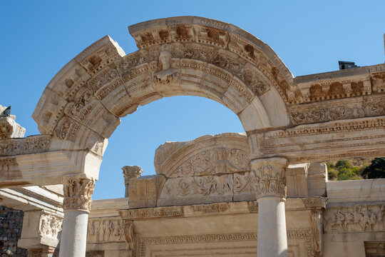 View of the Temple of Hadrian with intricate stone carvings and Corinthian columns at the Ephesus Ancient City in Selcuk, Izmir, Turkiye.