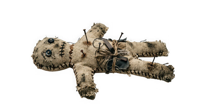 A single voodoo doll made of burlap with buttons for eyes and pins stuck in it isolated on transparent background
