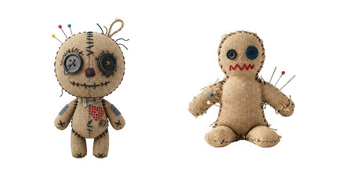 Two voodoo dolls made of burlap with buttons for eyes and pins stuck in them isolated on transparent background