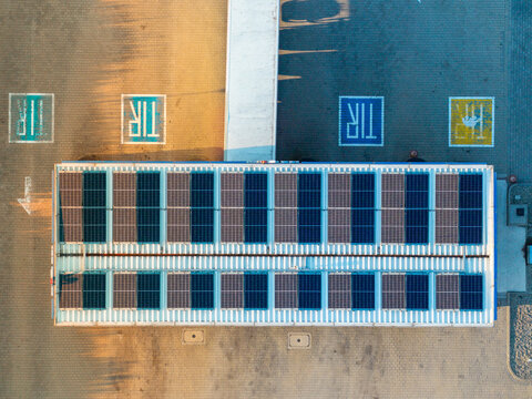 Shipping container building with solar panels providing renewable energy for sustainability