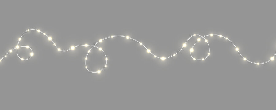 Luminous Christmas garland PNG with soft glowing LED bulbs. Warm festive lights add elegance. Isolated decoration for holiday graphics.