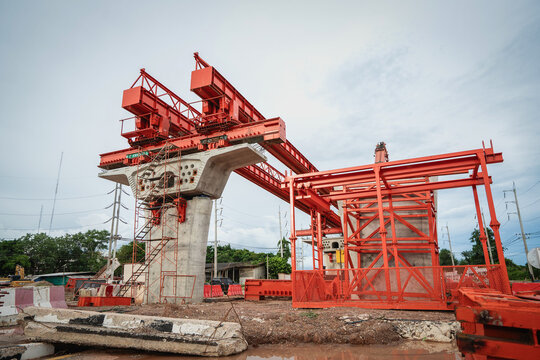 Road construction structure on a concrete bridge at the construction site of a concrete bridge over an intersection, expressway, or bypass.