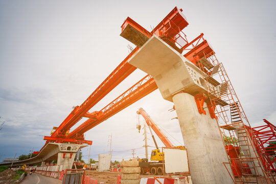 Road construction structure on a concrete bridge at the construction site of a concrete bridge over an intersection, expressway, or bypass.