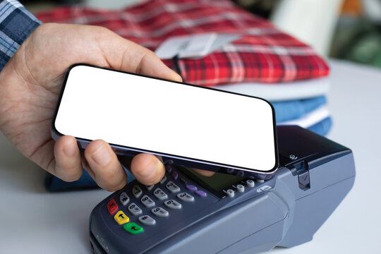 Man hand payment purchase for phone and pay pass online terminal