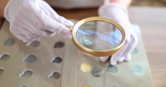 A collector examines unique coins using a magnifying glass in a warm and inviting room filled with coin albums. Each detail reveals a story of history and value.