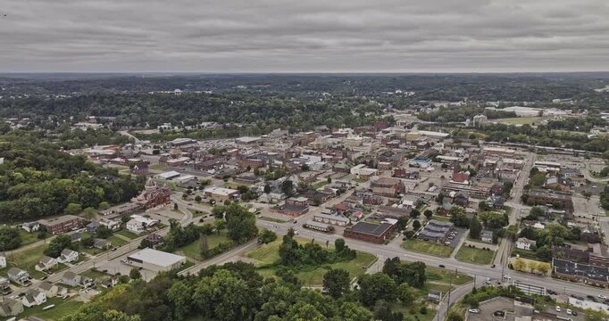 Zanesville Ohio Aerial v2 flyover above a neighborhood park toward the town center, wooded hillsides and Muskingum River corridor - Shot with Mavic 3 Pro Cine - Sept 22nd 2023
