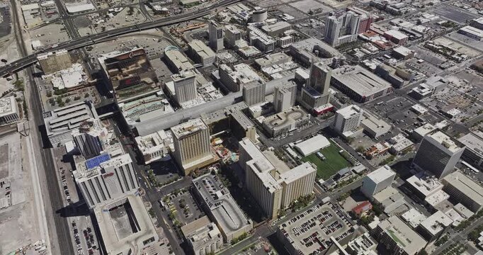 Las Vegas Nevada Aerial v202 birdseye flyover above historic downtown hotels, parking lots, streets and the freeway corridor - Shot with Mavic 3 Pro Cine - May 2nd 2024