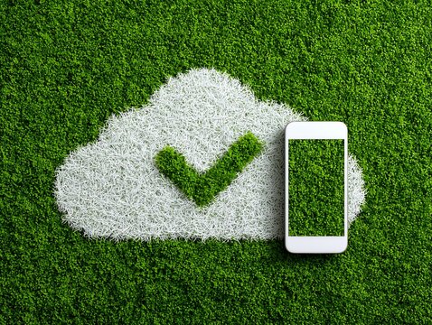 スマートフォンとクラウド連携のデータ管理を緑の芝生で表現