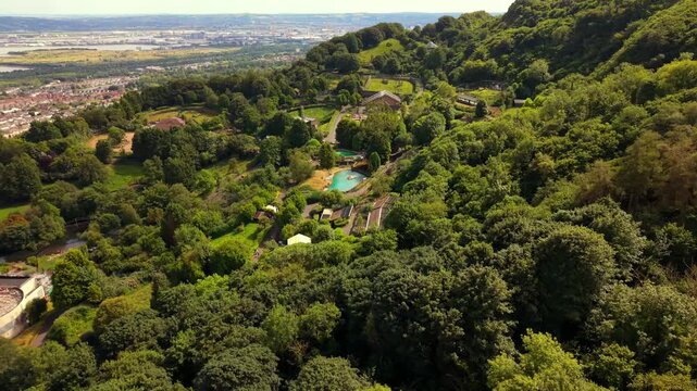 Rotating 4K 60FPS aerial video of Belfast Zoo and Cavehill in North Belfast, Northern Ireland in the UK on a bright sunny day. Produced with Rec709 colour.