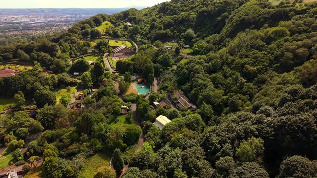 Clockwise 4K 60FPS aerial video of Belfast Zoo and Cavehill in North Belfast, Northern Ireland in the UK on a bright sunny day. Produced with Rec709 colour.