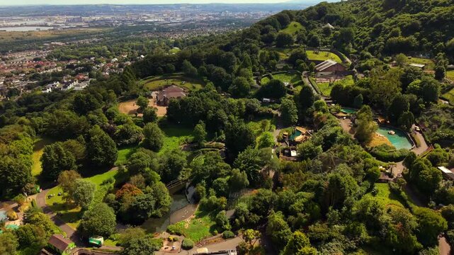 Reversing 4K 60FPS aerial video of Belfast Zoo and Cavehill in North Belfast, Northern Ireland in the UK on a bright sunny day. Produced with Rec709 colour.