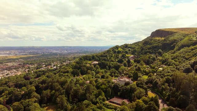 Wide 4K 60FPS aerial video of Belfast Zoo and Cavehill in North Belfast, Northern Ireland in the UK on a bright sunny day. Produced with Rec709 colour.