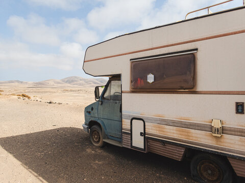 Vintage Camper Van in Desert Landscape