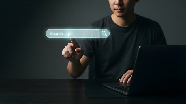 A professional developer uses advanced holography seo techniques to optimize a digital search interface while working on a laptop in a dark modern office environment