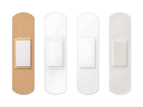 Set of adhesive bandages arranged in a row on white background