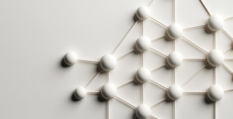 Obraz premium Abstract white spheres form a connected network on a clean minimalist background. This graphic represents interconnectedness, data flow, and complex systems for modern tech concepts.