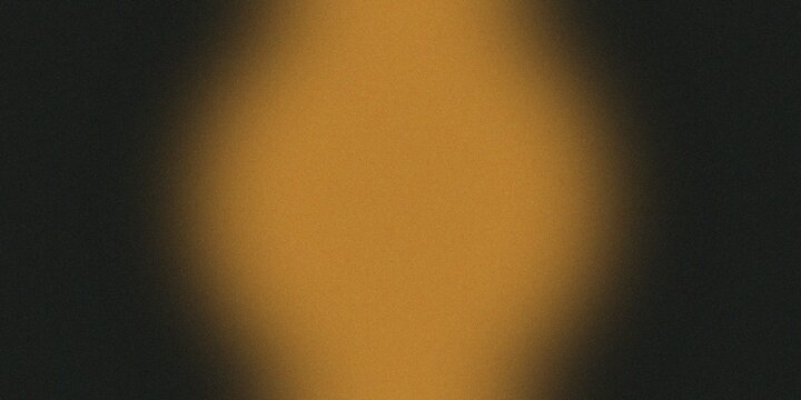 Abstract background with a gradient of warm orange and dark gray colors, soft focus effect.
